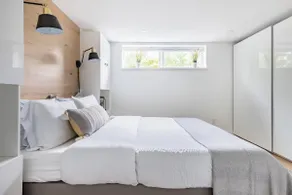 Industrial-Inspired Suite with Refined Neutral Interiors - Image 3