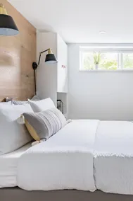 Industrial-Inspired Suite with Refined Neutral Interiors - Image 2