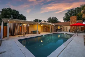 Spectacular 4BR/2.5B Home with Pool and Grill - Image 2