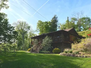 Lazy Bass Lodge | Riverfront + Porch - Image 2