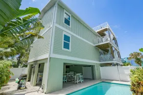 Family Tides – AMI Two-Unit Retreat w/ Pool, Rooftop Deck & Gulf/Bay Views - Image 2