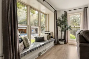 Fernwood Villa is a large family home with a five bedrooms, a pool table, a patio & a private backyard - Image 2