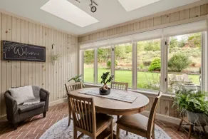 Fernwood Villa is a large family home with a five bedrooms, a pool table, a patio & a private backyard - Image 3