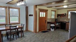 Bluebird Hollow is a cozy little home in the woods - Image 5