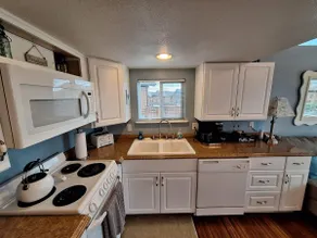 Ocean Cabin 23 is a cozy seaside bungalow with loft, limited ocean views, and private beach. - Image 2