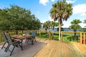 82 Palms - Waterfront Home & Rooftop Sun Deck - Image 4