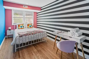 Colorful Designer Home with Rec Room and Bar - Image 3