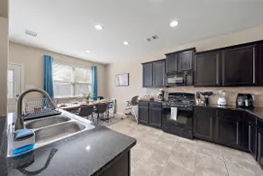 Near IAH Houston Home | Yard BBQ Games Wi-Fi Pets - Image 2