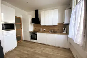 Luxurious renovated apartment with balcony & garage - Image 4