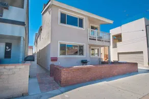 Super cute & beautifully remodeled lower unit just one house away from beach fun - Image 3
