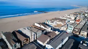 Fabulous upper unit on a fabulous street just one house from the beach! - Image 3