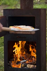 tiny house with outdoor pizza oven on estate - Image 5