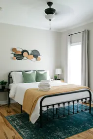 Sleep well in a quiet Cottage Hill retreat just a six-block walk from downtown, with a king bed, dedicated parking, and a stay guests return to again and again. - Image 2
