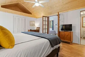 Bright 2BR Cabin with Sunroom Firepit Near Trails - Image 5