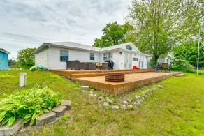 Lakefront Gladwin Vacation Rental w Deck & Dock - Image 2