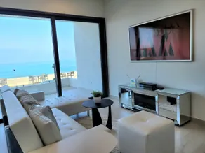 Seafront Condo Pool and Jacuzzi - Image 2