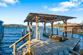 Scenic lakefront retreat with water access, private dock, grill, W/D & fireplace - Image 2