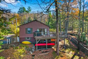 Scenic lakefront retreat with water access, private dock, grill, W/D & fireplace - Image 4