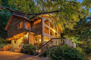 Lovely, open home with water views, scenic deck, & 2 fireplaces - near Seattle - Image 4