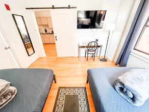 2BDRM Suite w Parking ROKU TVs & 4 beds #204 - Image 2