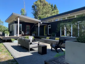 Modern, Secluded Retreat - Walk to the Plaza! - Image 2