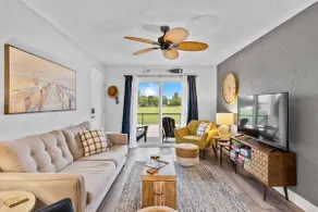 Waterfront condo w/ decks & beach access - Image 5