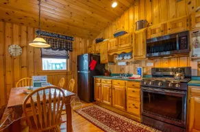 Niboban Cabin 5 right on Rangeley Lake with a screened porch, fire pit, hammock, WiFi and dock! - Image 4