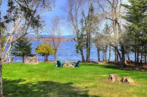 Niboban Cabin 5 right on Rangeley Lake with a screened porch, fire pit, hammock, WiFi and dock! - Image 3
