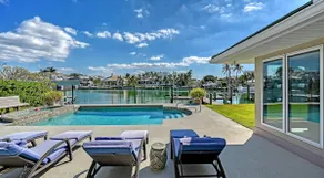 Gorgeous Canalfront Home w/ Heated Pool • 5-Min Walk to Lido Beach • Boat Dock - Image 4