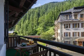 Le Bellevue 08 Cozy Alpine Apartment | Pool & Mountain Views - Happy Rentals - Image 2