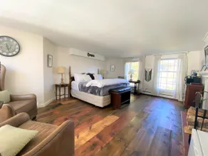 Deluxe King Suite, Living Room area w/sofa bed & fireplace, private entrance - Image 2