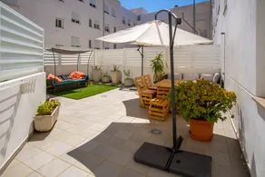Cute and bright flat with A/C | Garage and patio - Image 2