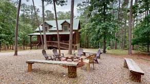 Acorn Acres is a true log cabin nestled in - Image 2