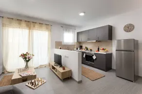 Two-Bedroom Apt Semi-Basement Aristotelian Suites - Image 5