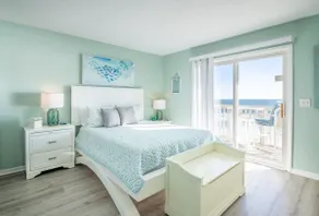Condo familial en bord de mer avec installations incroyables, accès à la piscine et à la plage, kiosques de jardin et centre de loisirs avec gymnase, piscine intérieure / jacuzzi et salons. - Image 2