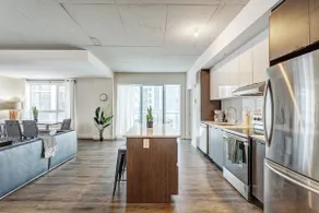 Urban 2BR Escape In-suite Laundry and Terrace - Image 4