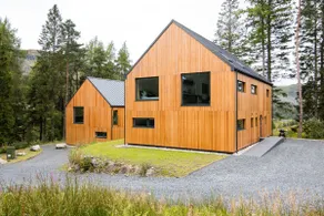 An Caisteal Lodge with cascading waterfall view - Image 3