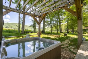 Cozy Cabin with Hot Tub and Fire Pit - Image 2