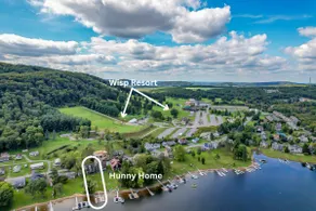 Walk to Wisp Flat Lakefront Fire Pit and Huge Dock - Image 2