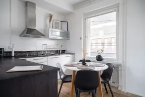 1BR Penthouse with Sauna & Rooftop Terrace - Image 2
