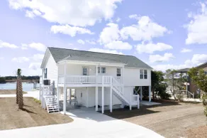 Waterfront home with Private Dock Hot tub and swimming as well as a large fenced backyard - Image 3