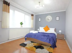 Cheerful 3 Bedroom 2 Bathroom Bungalow by CozyNest - Image 2