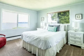 Peaceful Beachfront Getaway w Sweeping Water Views - Image 5