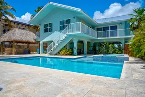 P18 - Spectacular 4 bedroom home with dockage and oversized private pool in Key Colony! - Image 2