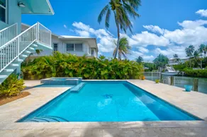 P18 - Spectacular 4 bedroom home with dockage and oversized private pool in Key Colony! - Image 3