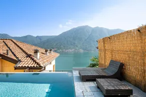 Ático en Colonno con vistas al lago, piscina infinita y jacuzzi - Image 2