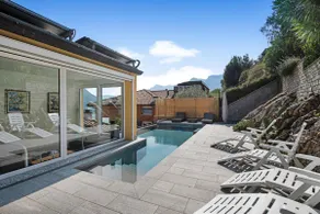 Ático en Colonno con vistas al lago, piscina infinita y jacuzzi - Image 3