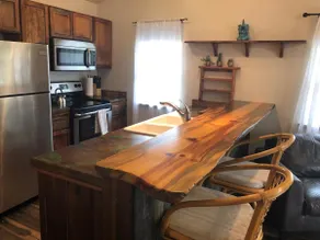 Rustic, modern, and cozy condo located in central Missoula on the Milwaukee Path bike trail. - Image 3