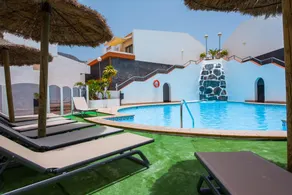 Sunny Haciendas IV · 2BR Apt with Sea View Balcony - Image 3