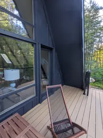 Cozy Vermont A-frame on a quiet private road, minutes from Stratton. Enjoy year-round adventure, then unwind in the hot tub under the stars. Spacious, stylish, and perfect for groups seeking both relaxation and outdoor fun. - Image 4